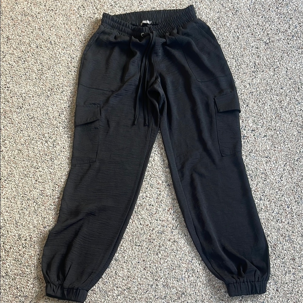Woman’s black cargo style pantss. Size large smalll. From Maurice’s.